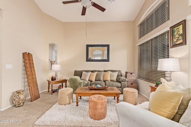 living room featuring ceiling fan and carpet floors