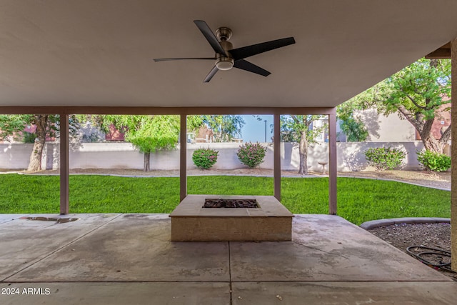 view of patio / terrace featuring a fire pit and ceiling fan