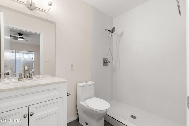 bathroom with ceiling fan, a shower, toilet, and vanity