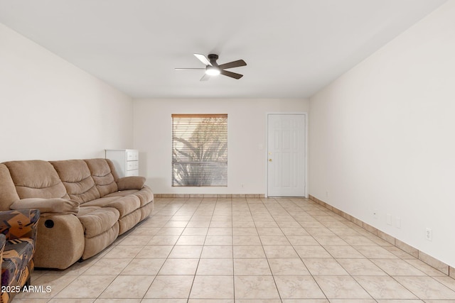 unfurnished living room with ceiling fan and light tile patterned floors