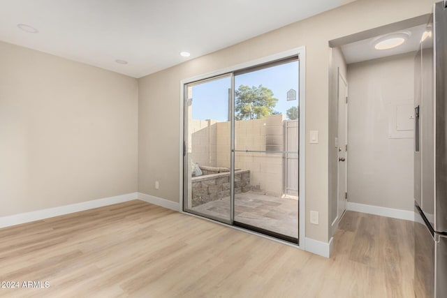 empty room featuring light hardwood / wood-style floors