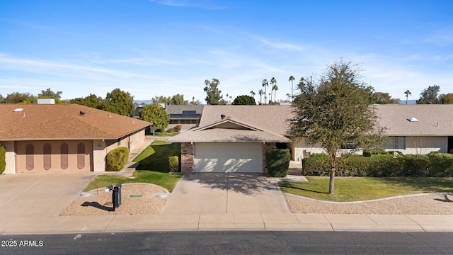 ranch-style house with a garage and a front lawn