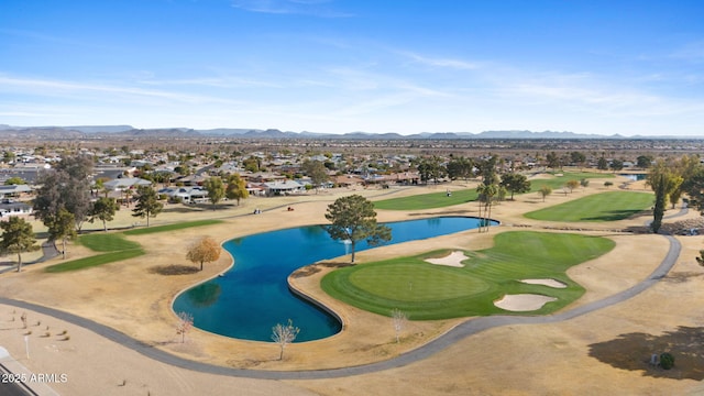 view of pool with a water and mountain view