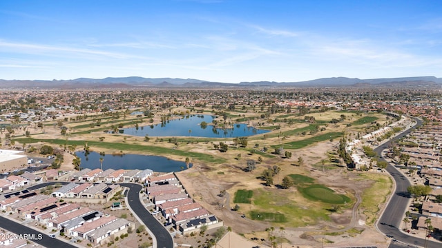 birds eye view of property featuring a water and mountain view