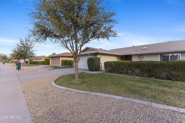 single story home with a garage and a front yard