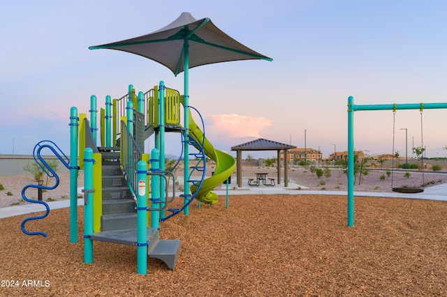 view of playground at dusk