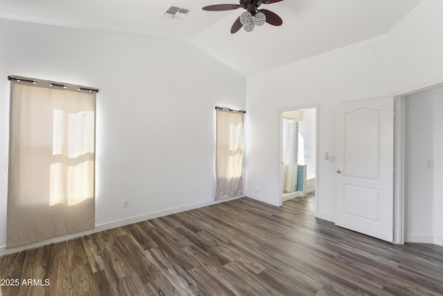 unfurnished bedroom featuring lofted ceiling, baseboards, visible vents, and wood finished floors