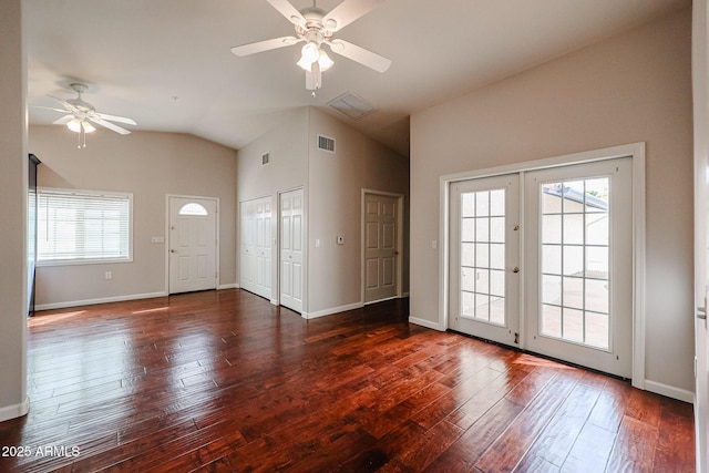 interior space with a healthy amount of sunlight, visible vents, hardwood / wood-style floors, and french doors