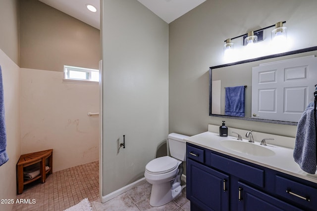 full bathroom with baseboards, toilet, tile patterned flooring, walk in shower, and vanity