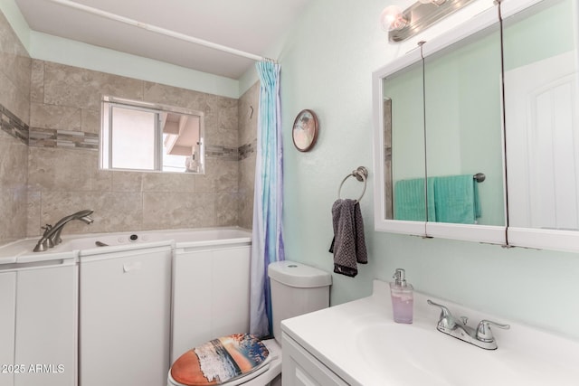 bathroom featuring vanity, a bathing tub, toilet, and a shower with curtain