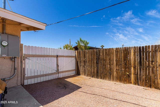 exterior space featuring a gate and fence