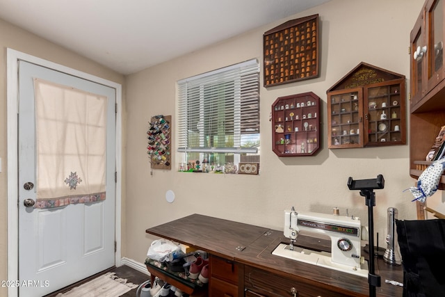 bar with baseboards and wood finished floors