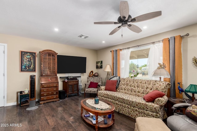 living room with a ceiling fan, visible vents, dark wood-style floors, and recessed lighting