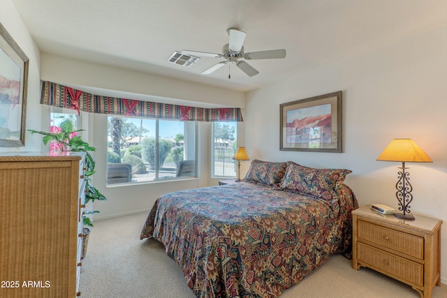 15371 W Piccadilly Rd, Goodyear, AZ 85395 - bedroom with a ceiling fan, carpet floors, baseboards, and visible vents