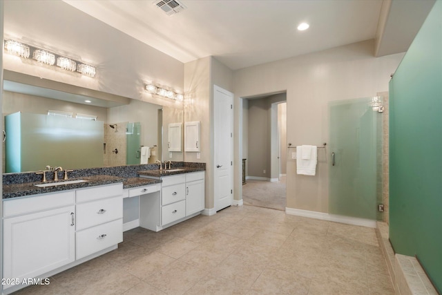 8597 E Arroyo Seco Rd, Scottsdale, AZ 85266 - full bathroom featuring a shower stall, a sink, visible vents, and double vanity