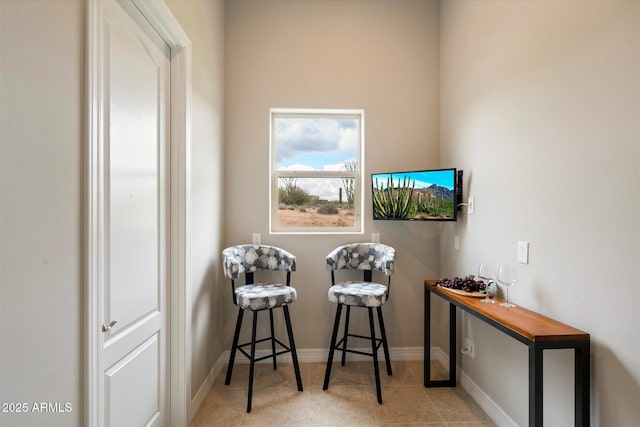 8597 E Arroyo Seco Rd, Scottsdale, AZ 85266 - living area featuring tile patterned flooring and baseboards