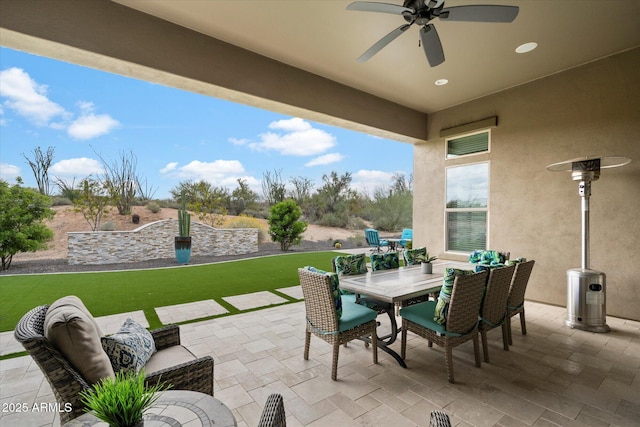 8597 E Arroyo Seco Rd, Scottsdale, AZ 85266 - view of patio / terrace with outdoor dining area and ceiling fan