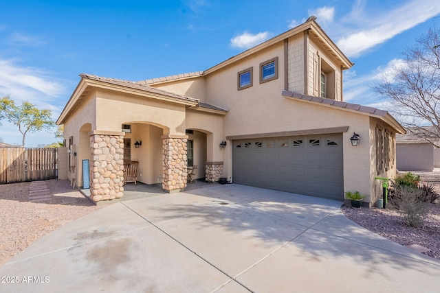 view of front of home with a garage