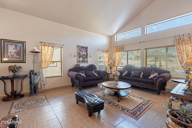 living room featuring high vaulted ceiling