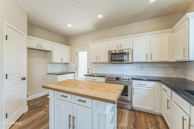1717 E Joseph Way, Gilbert, AZ 85295 - kitchen with stainless steel appliances, wood counters, white cabinetry, recessed lighting, and dark wood finished floors