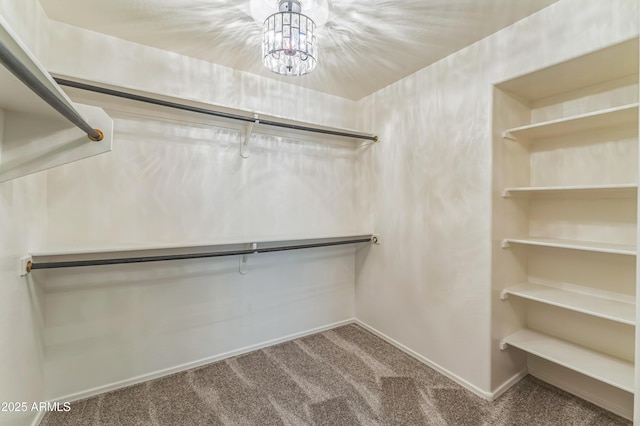 1717 E Joseph Way, Gilbert, AZ 85295 - walk in closet featuring carpet floors and a chandelier