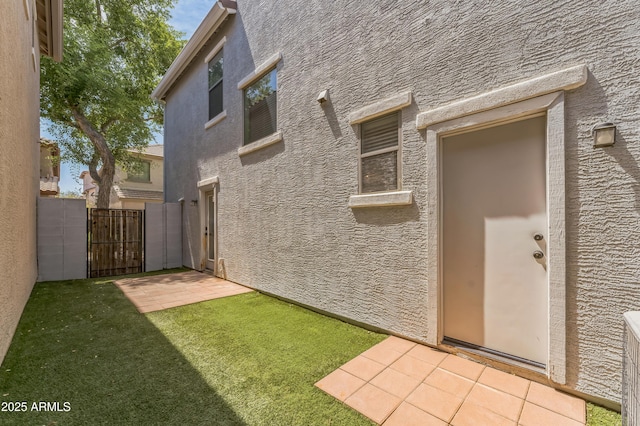 1717 E Joseph Way, Gilbert, AZ 85295 - property entrance featuring a gate and stucco siding