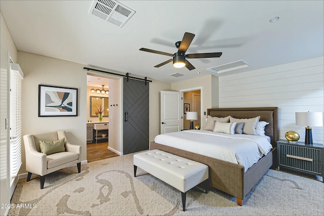 1717 E Joseph Way, Gilbert, AZ 85295 - carpeted bedroom featuring a barn door, ensuite bath, and ceiling fan
