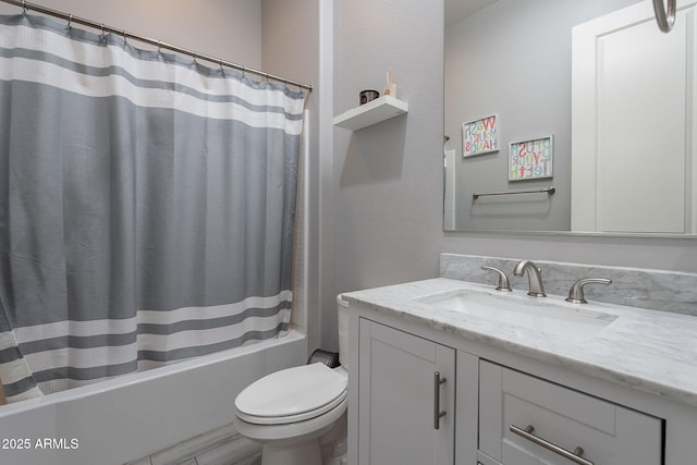 9345 W Robin Ln, Peoria, AZ 85383 - full bathroom featuring vanity, toilet, and shower / bathtub combination with curtain