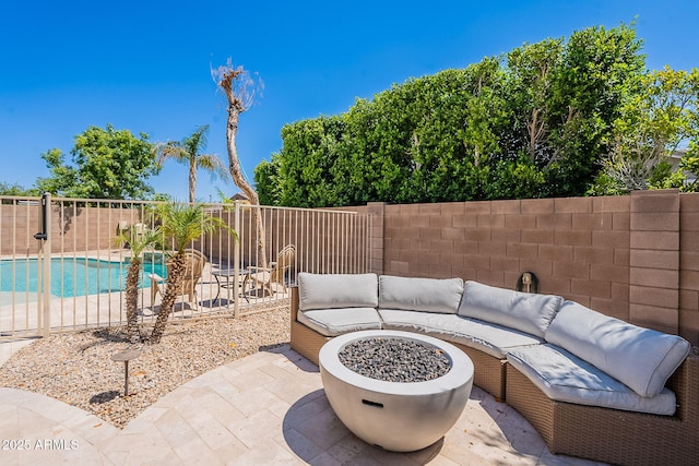 9345 W Robin Ln, Peoria, AZ 85383 - fenced backyard featuring a patio and an outdoor living space with a fire pit