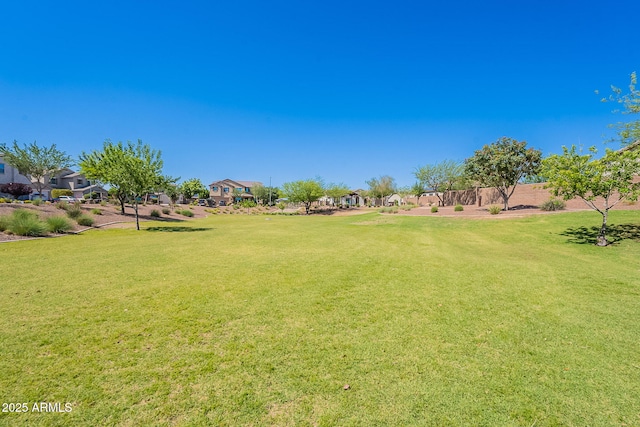 9345 W Robin Ln, Peoria, AZ 85383 - view of green lawn featuring a residential view