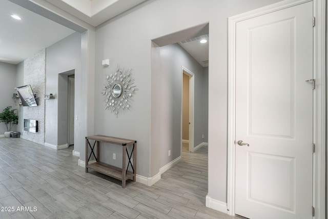 9345 W Robin Ln, Peoria, AZ 85383 - hall featuring light wood-type flooring, baseboards, and recessed lighting