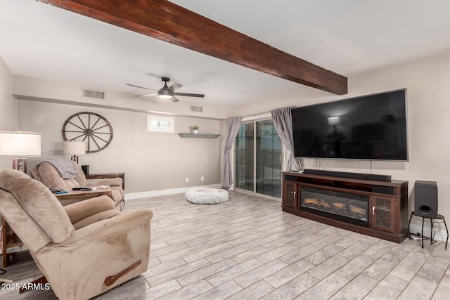 5484 E 36th Ave, Apache Junction, AZ 85119 - living room with beam ceiling, ceiling fan, and wood finished floors