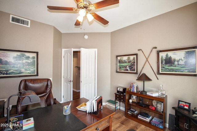 office space with hardwood / wood-style flooring