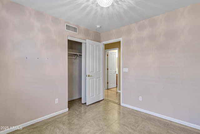 625 W Douglas Ave, Gilbert, AZ 85233 - unfurnished bedroom featuring baseboards and a closet