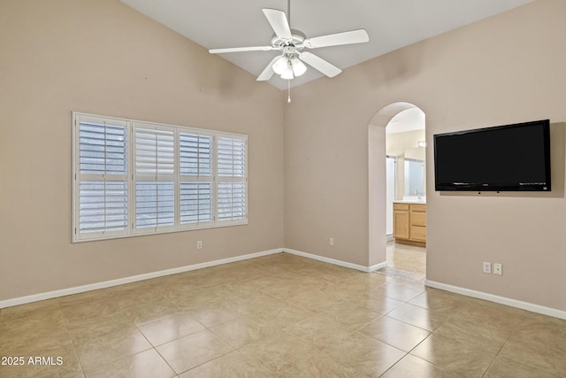 625 W Douglas Ave, Gilbert, AZ 85233 - spare room featuring a ceiling fan, arched walkways, and light tile patterned floors