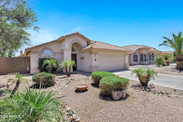 625 W Douglas Ave, Gilbert, AZ 85233 - mediterranean / spanish-style house featuring stucco siding, a garage, a tile roof, and driveway
