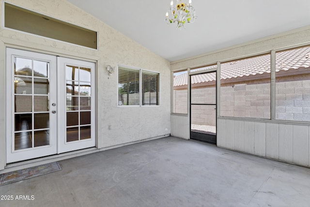625 W Douglas Ave, Gilbert, AZ 85233 - unfurnished sunroom featuring french doors, lofted ceiling, and a chandelier