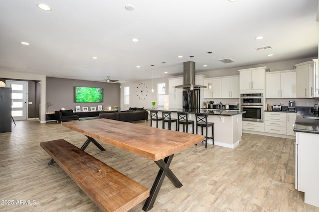 3247 E Creosote Ln, Gilbert, AZ 85298 - dining space with recessed lighting, light wood-type flooring, ceiling fan, and baseboards