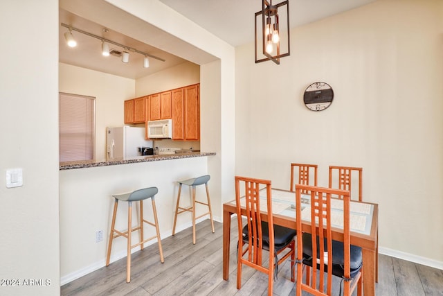 dining area featuring light hardwood / wood-style flooring