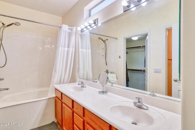 bathroom with shower / bathtub combination with curtain and vanity