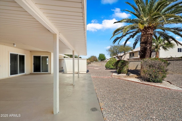 exterior space featuring a patio area and a fenced backyard