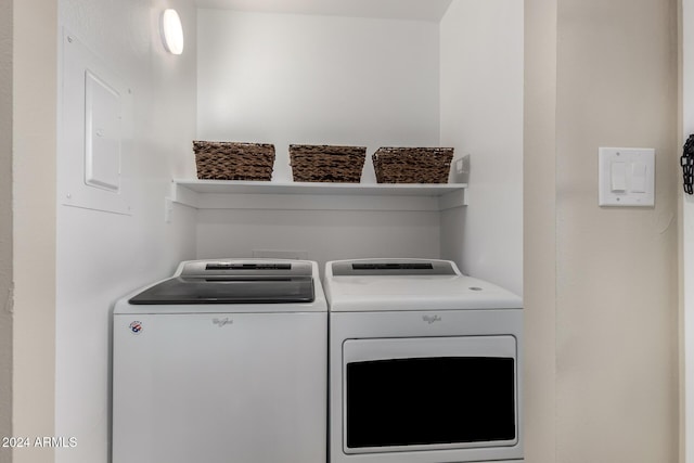 laundry room featuring separate washer and dryer