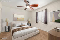 4414 E Hubbell St Unit 66, Phoenix, AZ 85008 - bedroom featuring a ceiling fan