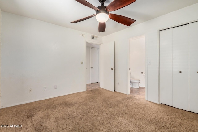 4414 E Hubbell St Unit 66, Phoenix, AZ 85008 - unfurnished bedroom featuring carpet, a closet, connected bathroom, and a ceiling fan