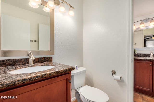 4414 E Hubbell St Unit 66, Phoenix, AZ 85008 - bathroom featuring vanity and a textured wall