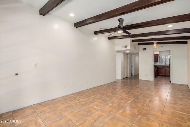4414 E Hubbell St Unit 66, Phoenix, AZ 85008 - unfurnished living room with ceiling fan, beam ceiling, and recessed lighting