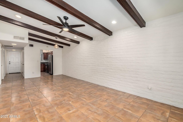 4414 E Hubbell St Unit 66, Phoenix, AZ 85008 - unfurnished living room featuring brick wall, ceiling fan, beam ceiling, and recessed lighting