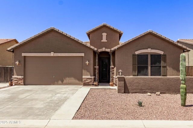 view of front of property with a garage