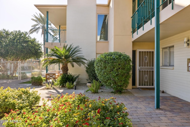 entrance to property with a patio