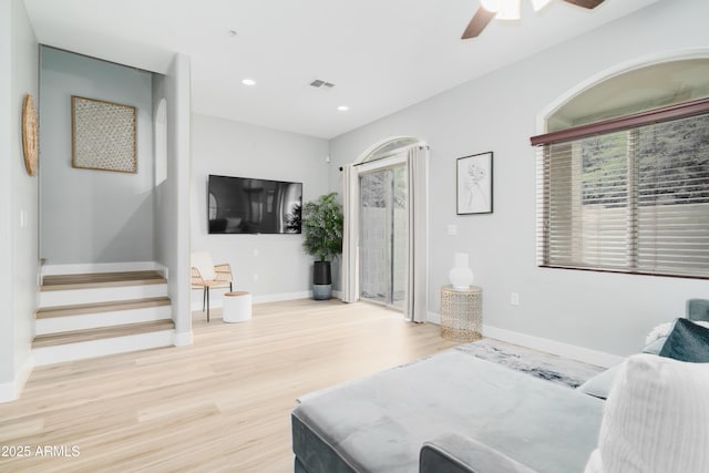 2402 E 5th St Unit 1498, Tempe, AZ 85288 - living area featuring wood finished floors, a ceiling fan, baseboards, stairway, and recessed lighting